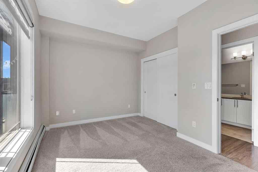 MLS® A2250058 - Unit #205 300 AUBURN MEADOWS Manor SE in Auburn Bay Calgary, Residential