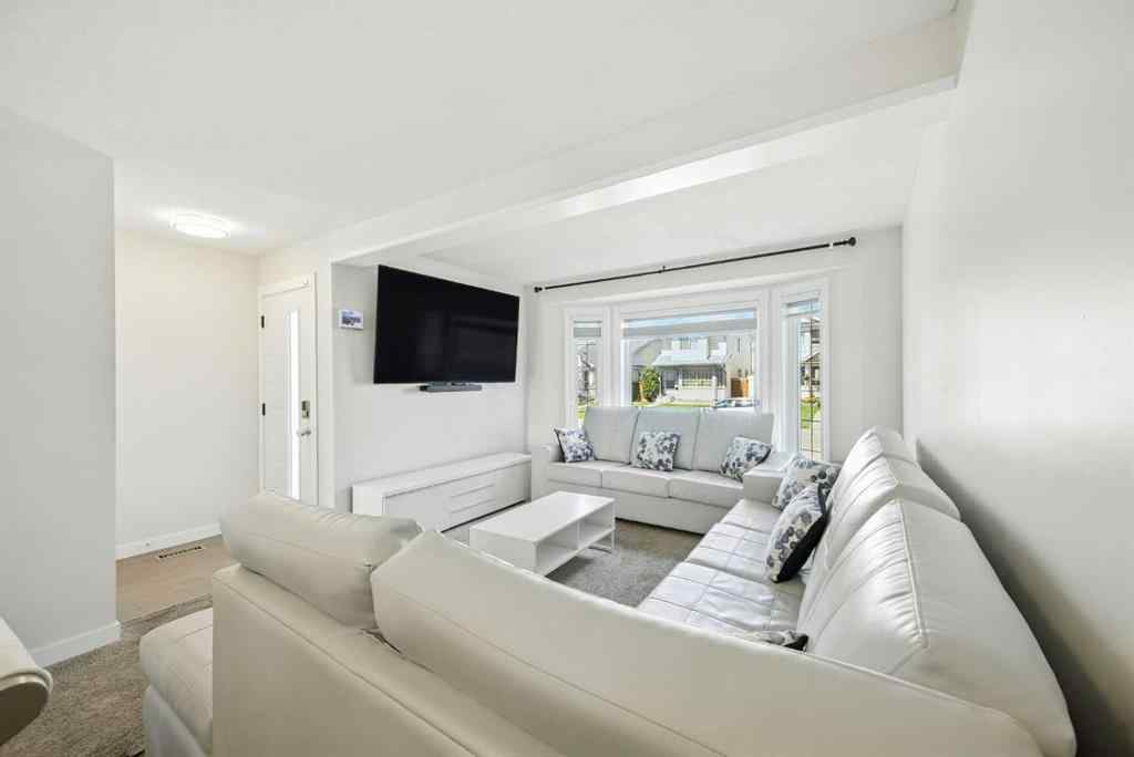 MLS® A2250067 - 99 Erin Road SE in Erin Woods Calgary, Residential