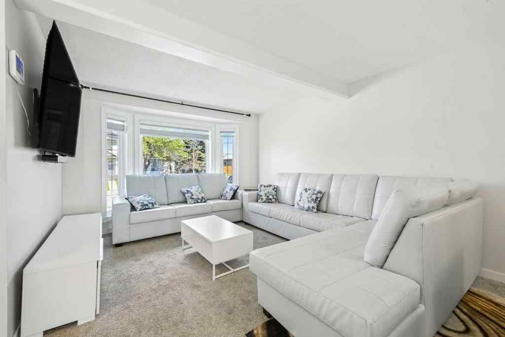 MLS® A2250067 - 99 Erin Road SE in Erin Woods Calgary, Residential