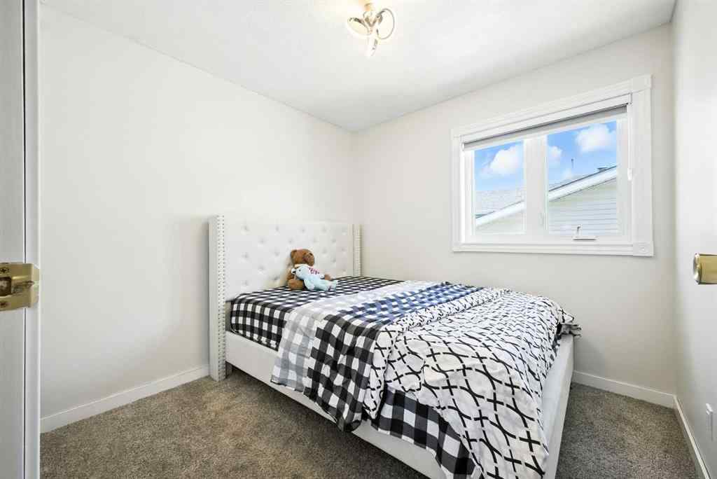 MLS® A2250067 - 99 Erin Road SE in Erin Woods Calgary, Residential
