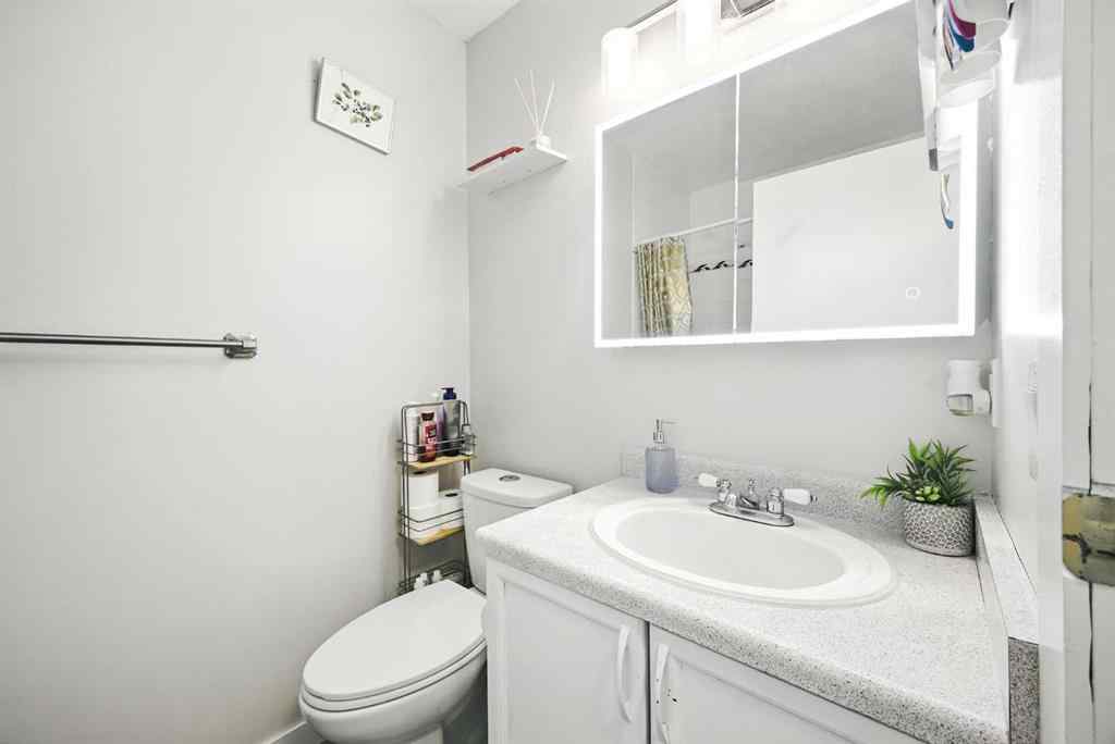 MLS® A2250067 - 99 Erin Road SE in Erin Woods Calgary, Residential