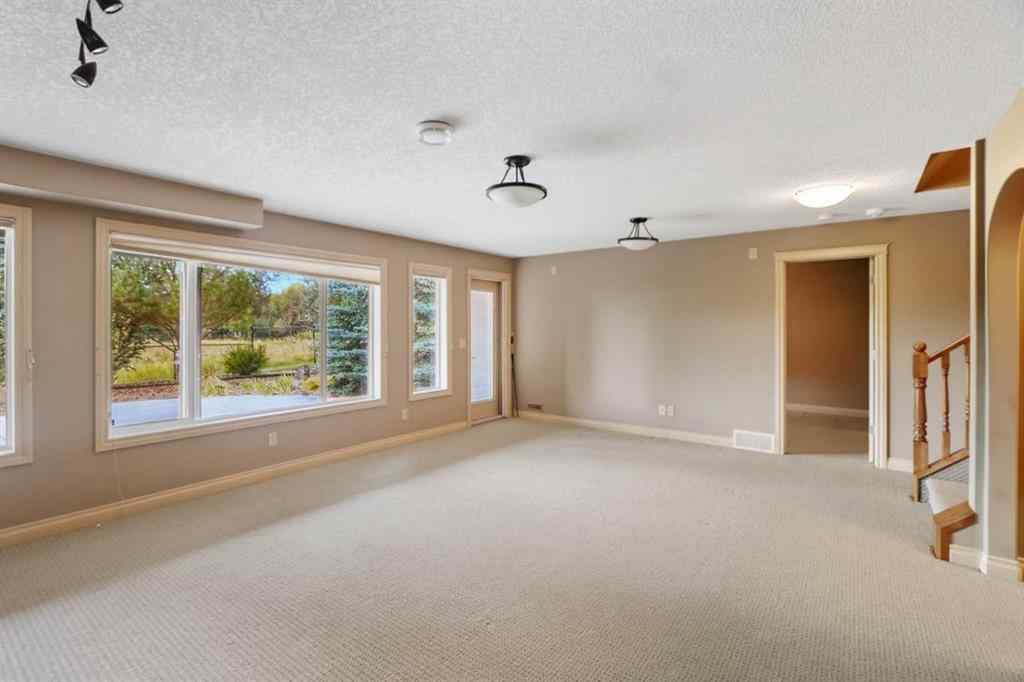 MLS® A2250088 - 55 Billy Haynes Trail  in Air Ranch Okotoks, Residential