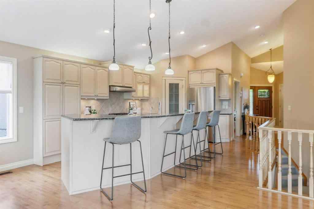 MLS® A2250088 - 55 Billy Haynes Trail  in Air Ranch Okotoks, Residential