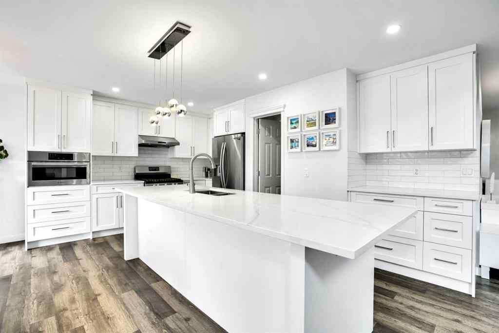 MLS® A2250090 - 73 Elkton Way SW in Springbank Hill Calgary, Residential