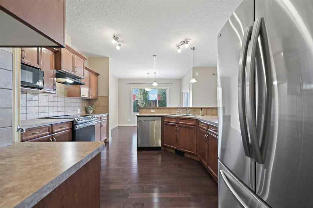 MLS® A2250114 - 229 Bridlerange Place SW in Bridlewood Calgary, Residential