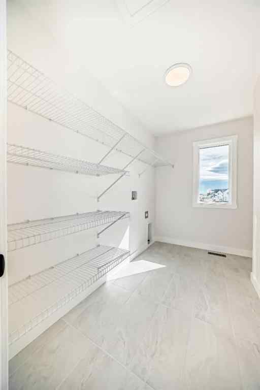 MLS® A2250129 - 211 Perch Bend  in Harmony Rural Rocky View County, Residential