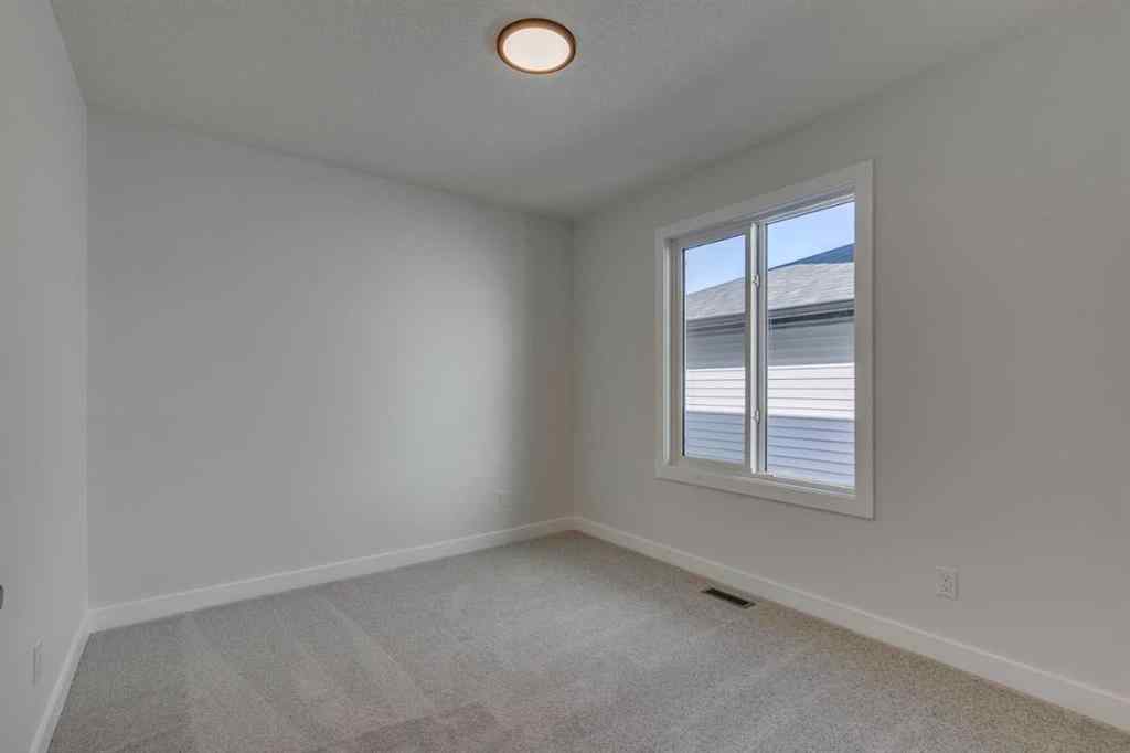 MLS® A2250164 - 60 Creekside Path SW in Pine Creek Calgary, Residential