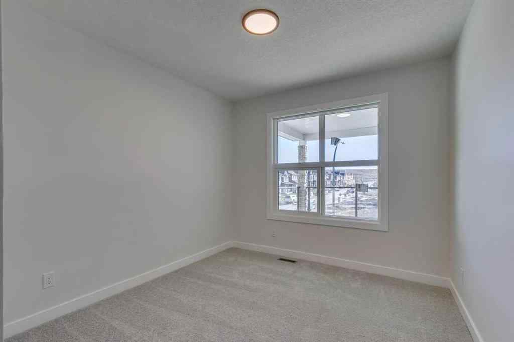 MLS® A2250164 - 60 Creekside Path SW in Pine Creek Calgary, Residential