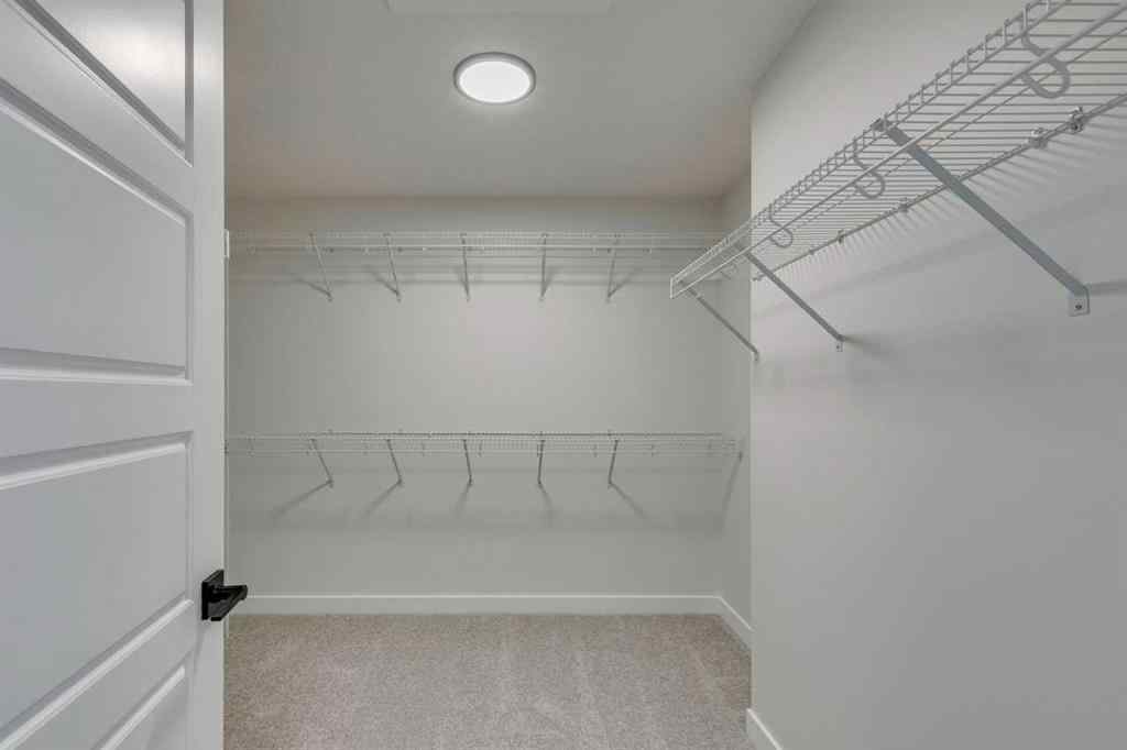 MLS® A2250164 - 60 Creekside Path SW in Pine Creek Calgary, Residential