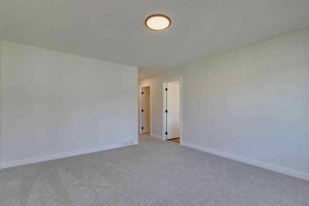 MLS® A2250164 - 60 Creekside Path SW in Pine Creek Calgary, Residential