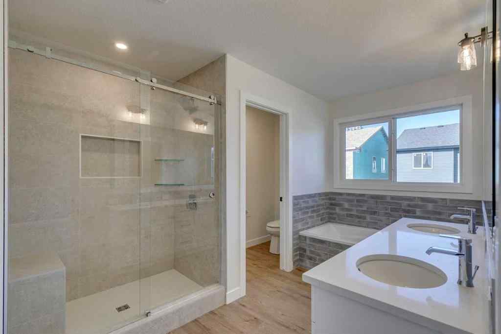 MLS® A2250164 - 60 Creekside Path SW in Pine Creek Calgary, Residential