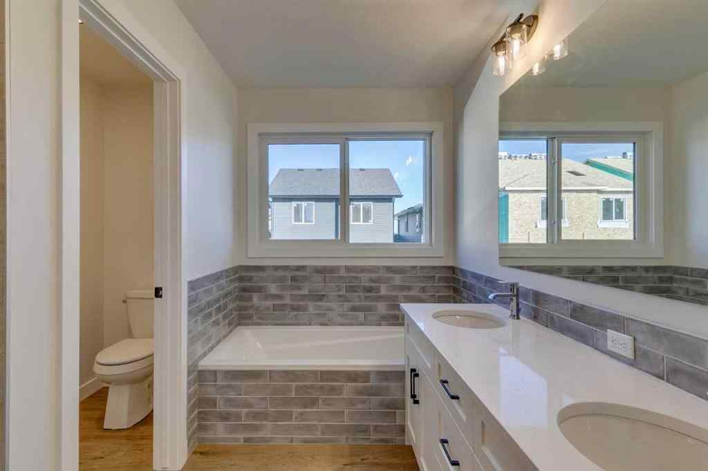 MLS® A2250164 - 60 Creekside Path SW in Pine Creek Calgary, Residential