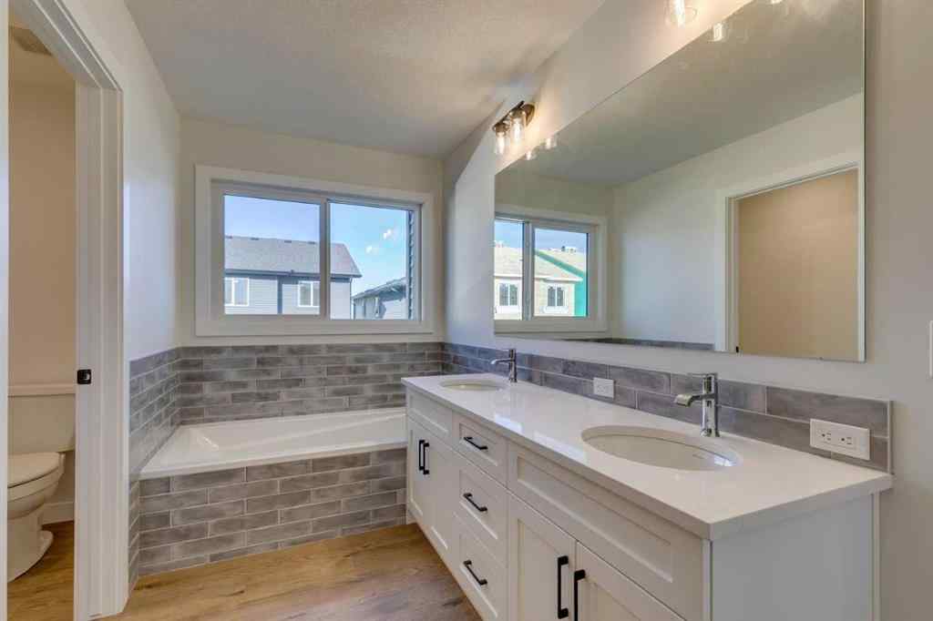 MLS® A2250164 - 60 Creekside Path SW in Pine Creek Calgary, Residential