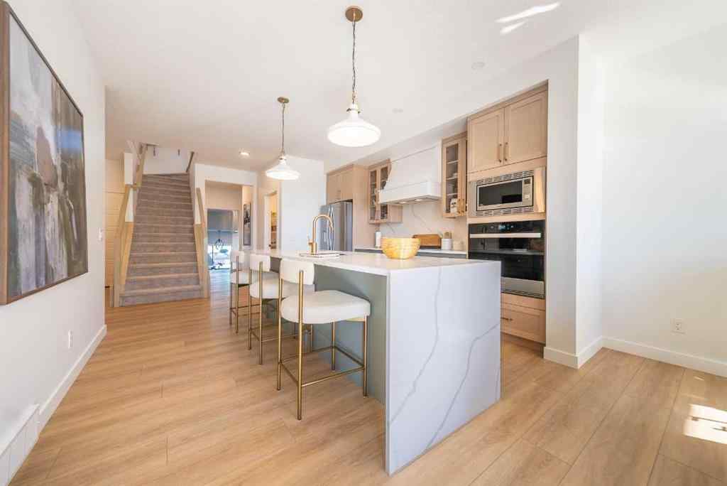 MLS® A2250164 - 60 Creekside Path SW in Pine Creek Calgary, Residential