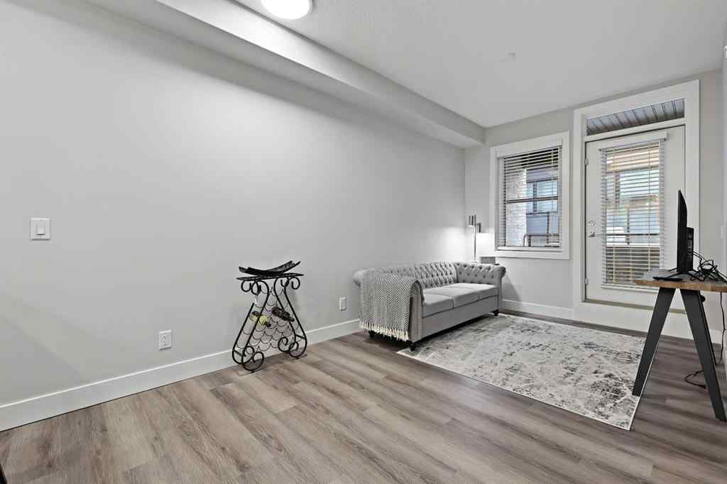 MLS® A2250195 - Unit #105 8355 19 Avenue SW in Springbank Hill Calgary, Residential