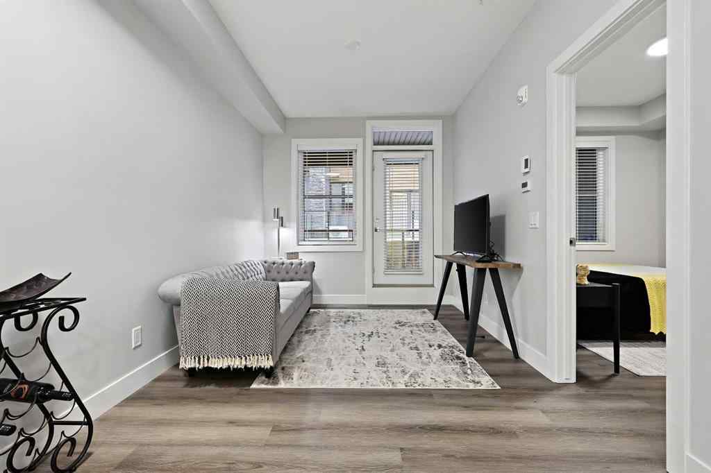 MLS® A2250195 - Unit #105 8355 19 Avenue SW in Springbank Hill Calgary, Residential