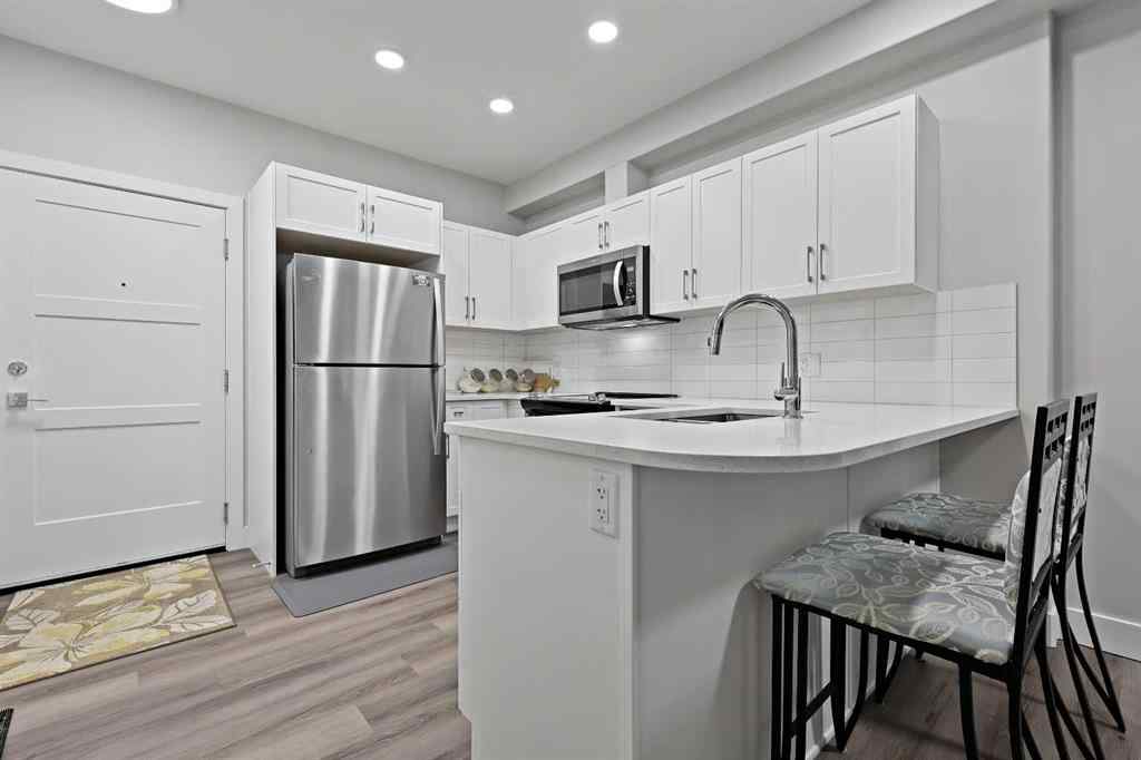 MLS® A2250195 - Unit #105 8355 19 Avenue SW in Springbank Hill Calgary, Residential