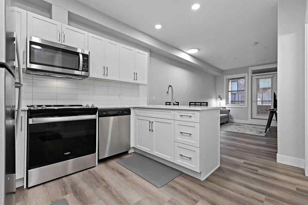 MLS® A2250195 - Unit #105 8355 19 Avenue SW in Springbank Hill Calgary, Residential