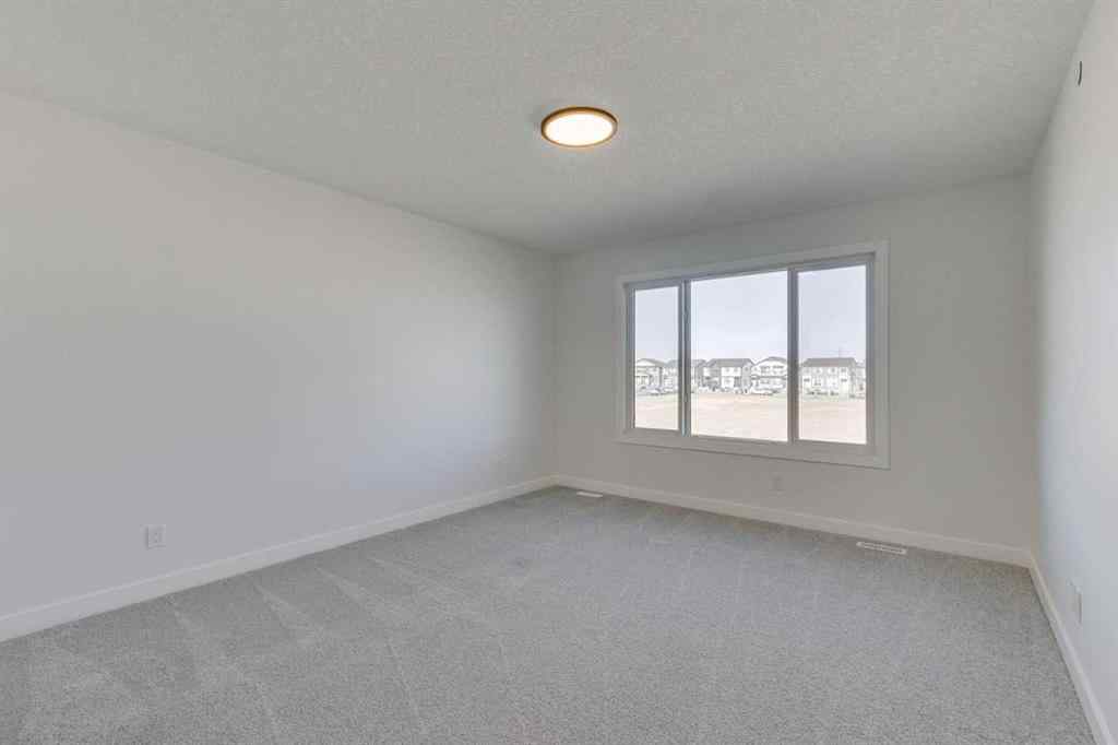 MLS® A2250197 - 152 Hotchkiss Common SE in Hotchkiss Calgary, Residential