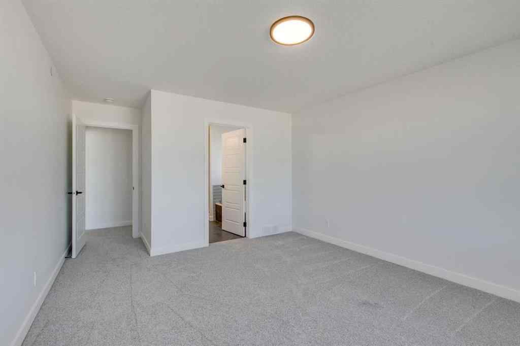 MLS® A2250197 - 152 Hotchkiss Common SE in Hotchkiss Calgary, Residential