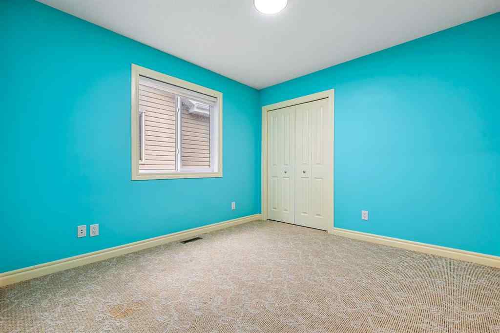 MLS® A2250210 - 8025 Cougar Ridge Avenue SW in Cougar Ridge Calgary, Residential