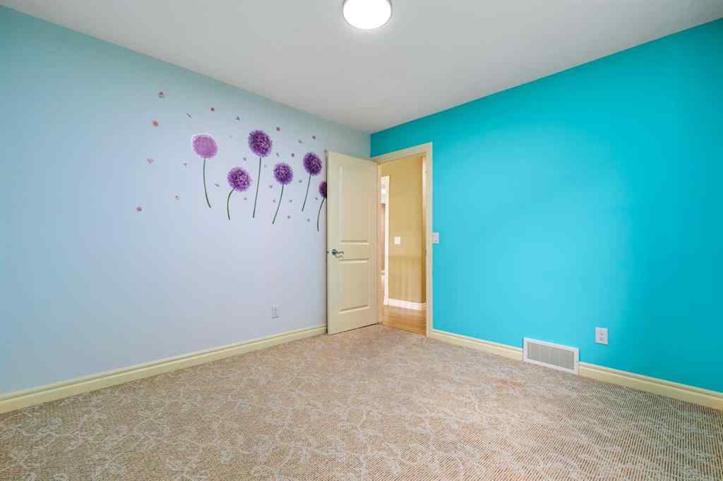 MLS® A2250210 - 8025 Cougar Ridge Avenue SW in Cougar Ridge Calgary, Residential