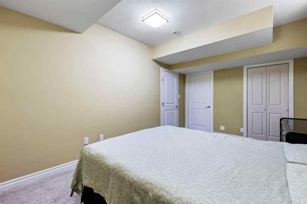 MLS® A2250210 - 8025 Cougar Ridge Avenue SW in Cougar Ridge Calgary, Residential