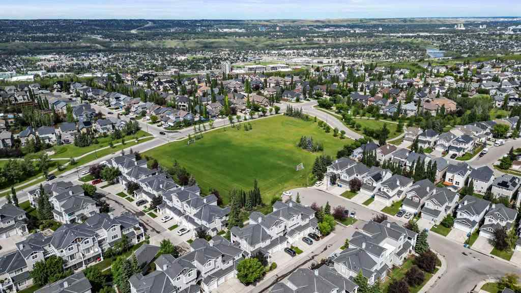 MLS® A2250210 - 8025 Cougar Ridge Avenue SW in Cougar Ridge Calgary, Residential