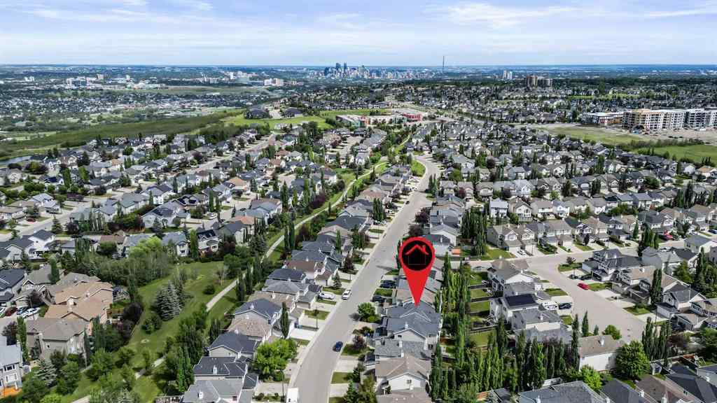 MLS® A2250210 - 8025 Cougar Ridge Avenue SW in Cougar Ridge Calgary, Residential
