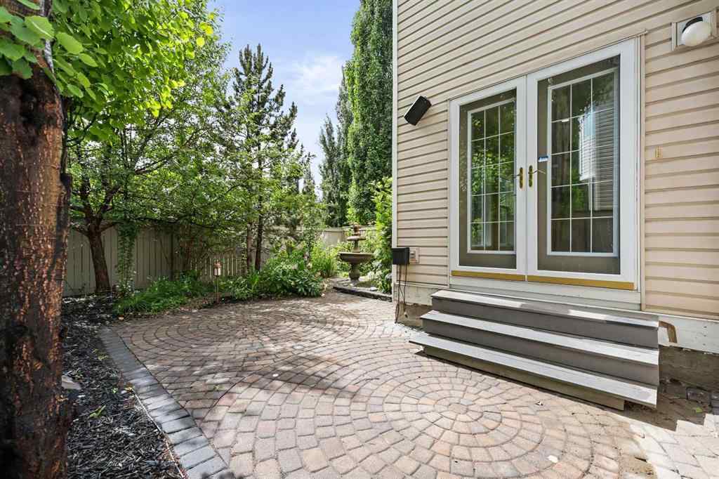 MLS® A2250210 - 8025 Cougar Ridge Avenue SW in Cougar Ridge Calgary, Residential