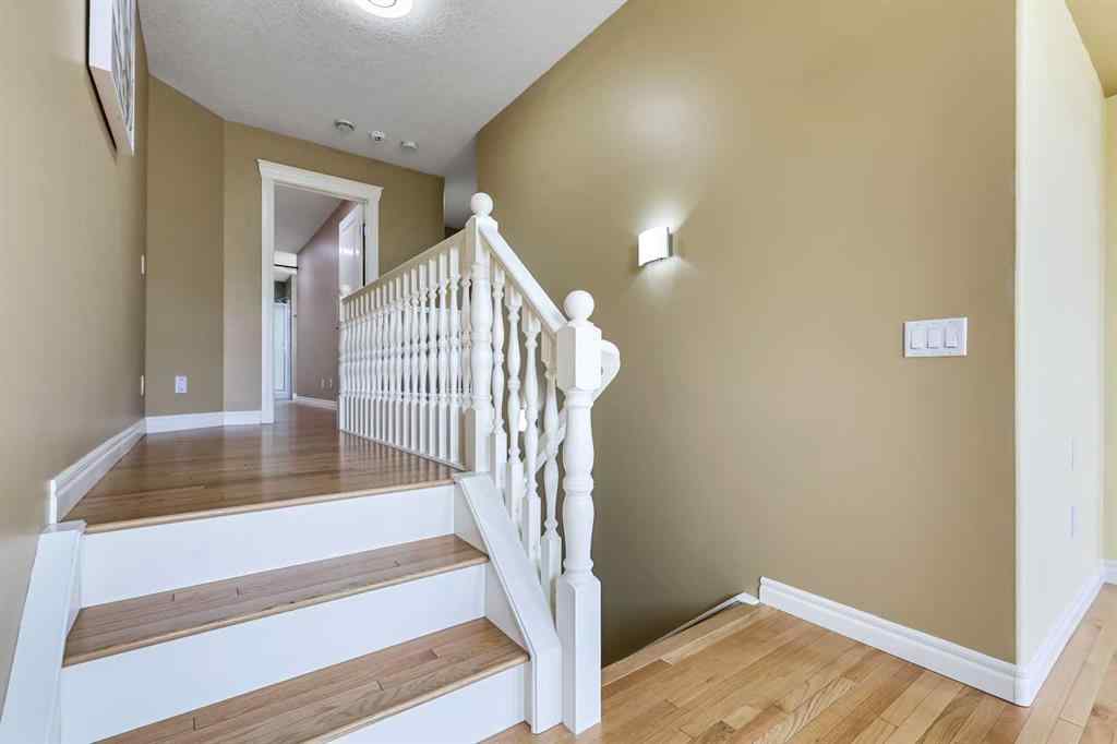 MLS® A2250210 - 8025 Cougar Ridge Avenue SW in Cougar Ridge Calgary, Residential