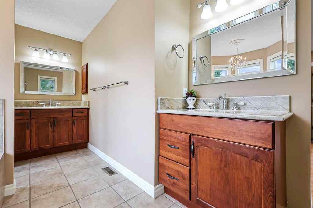 MLS® A2250210 - 8025 Cougar Ridge Avenue SW in Cougar Ridge Calgary, Residential