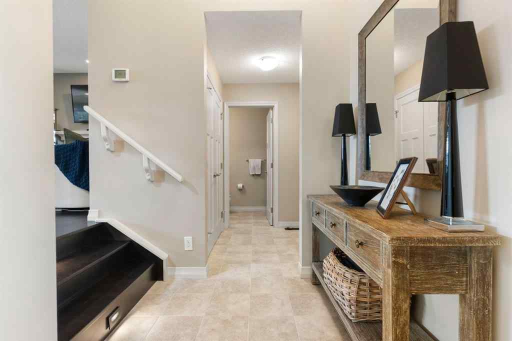 MLS® A2250217 - 33 Sundown Grove  in Sunset Ridge Cochrane, Residential