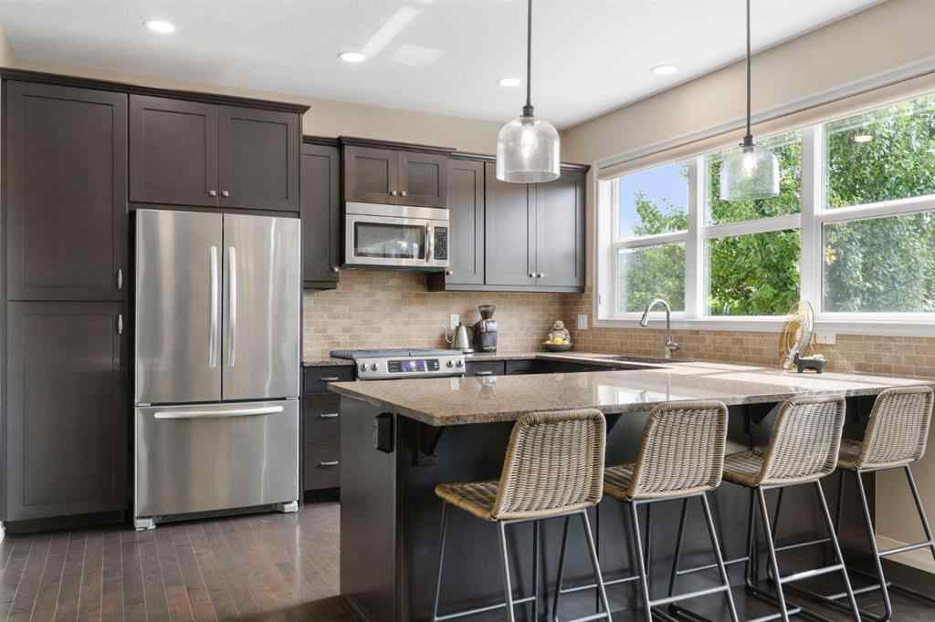 MLS® A2250217 - 33 Sundown Grove  in Sunset Ridge Cochrane, Residential