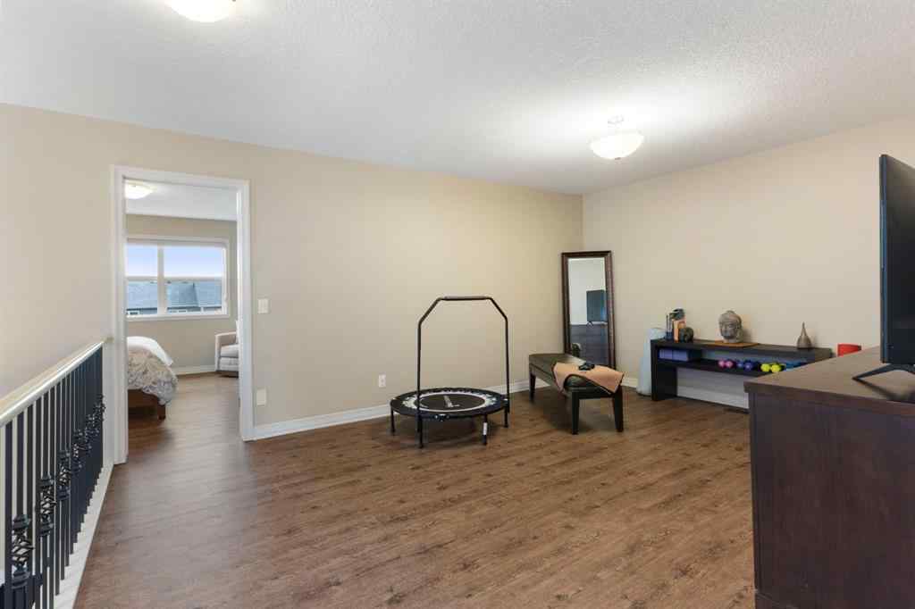 MLS® A2250217 - 33 Sundown Grove  in Sunset Ridge Cochrane, Residential