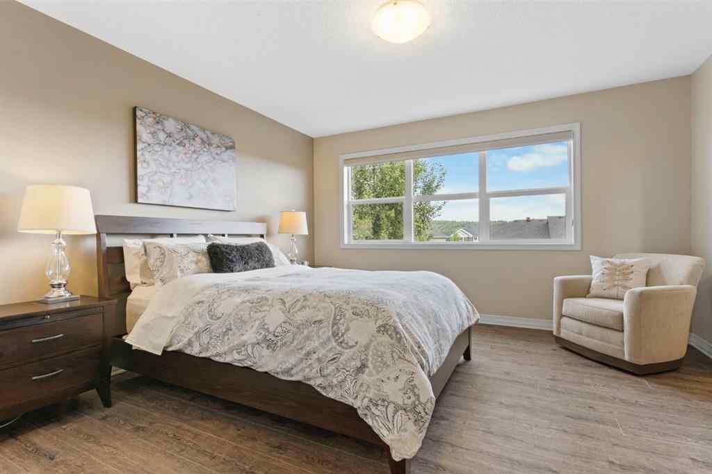 MLS® A2250217 - 33 Sundown Grove  in Sunset Ridge Cochrane, Residential