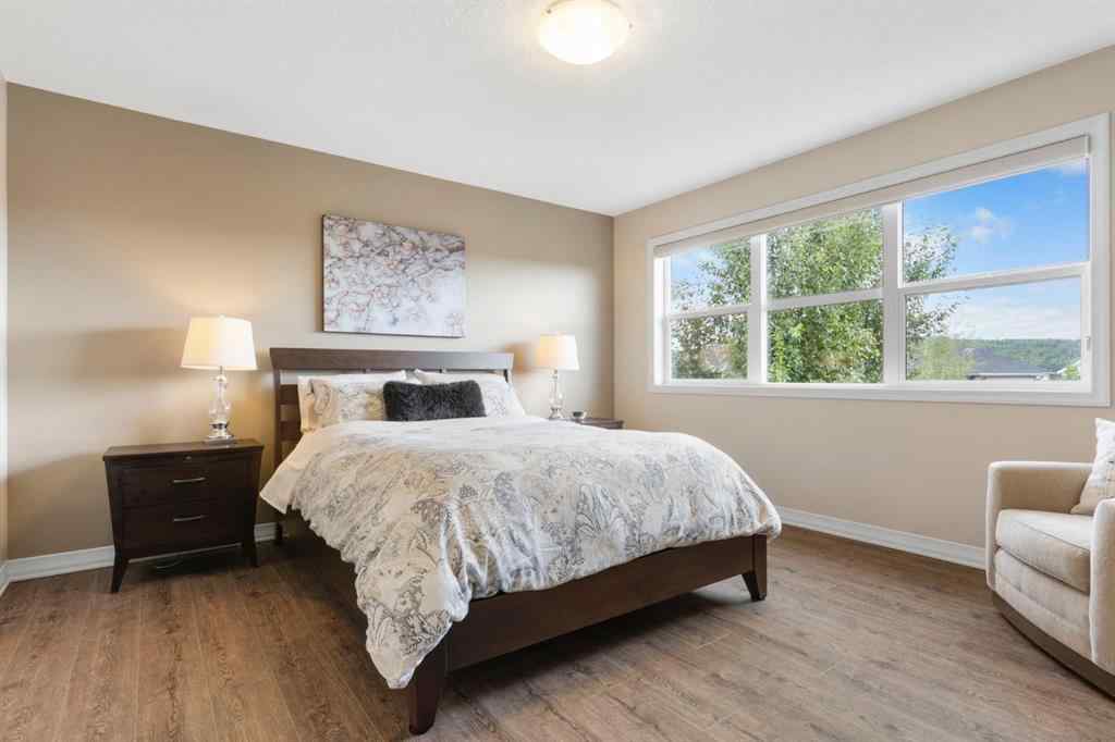 MLS® A2250217 - 33 Sundown Grove  in Sunset Ridge Cochrane, Residential