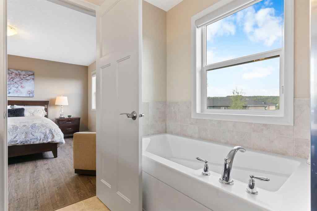 MLS® A2250217 - 33 Sundown Grove  in Sunset Ridge Cochrane, Residential