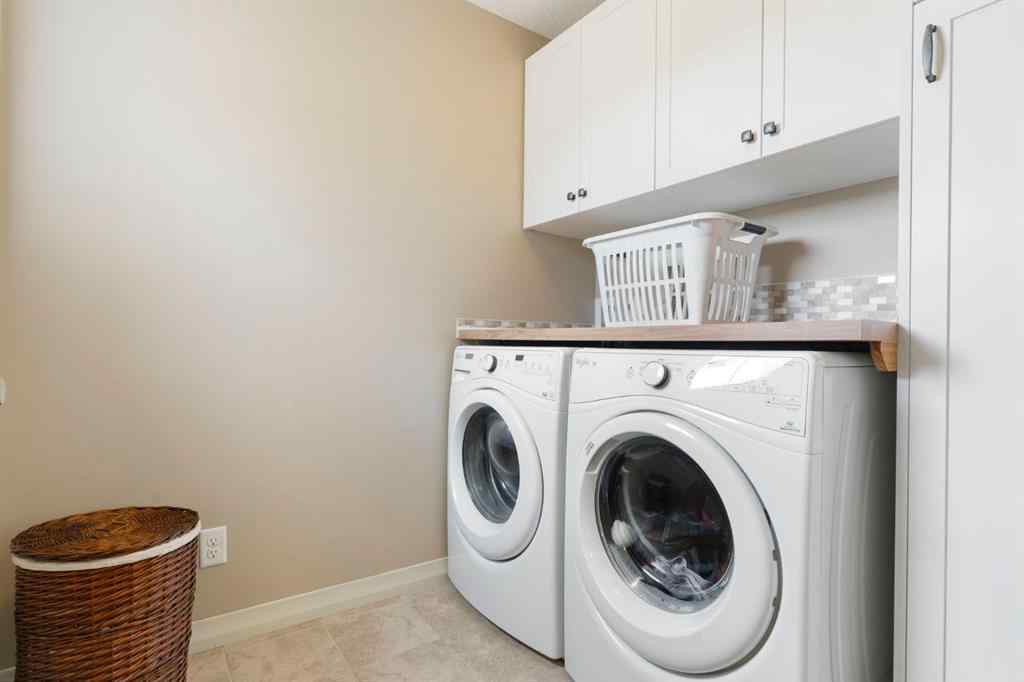 MLS® A2250217 - 33 Sundown Grove  in Sunset Ridge Cochrane, Residential