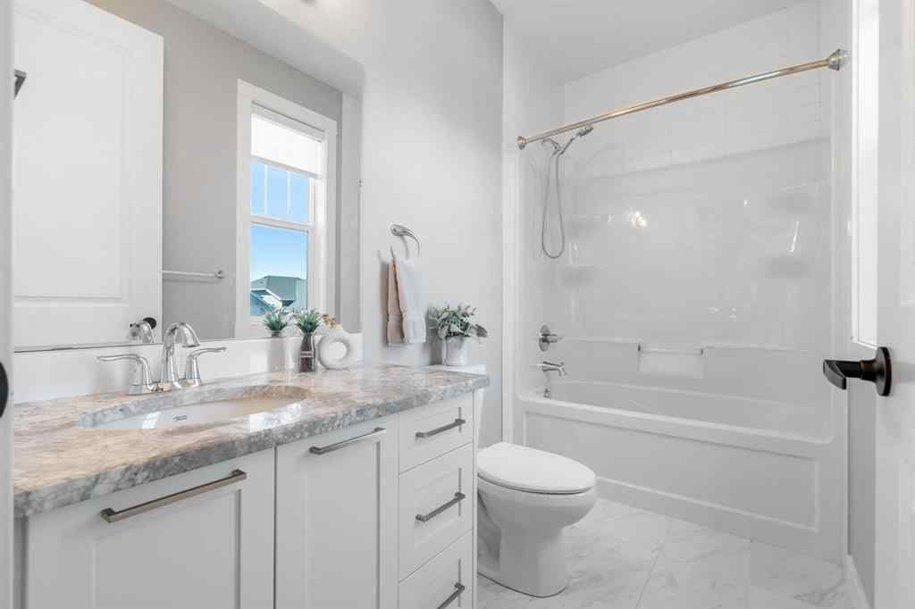 MLS® A2250237 - 117 West Grove Point SW in West Springs Calgary, Residential