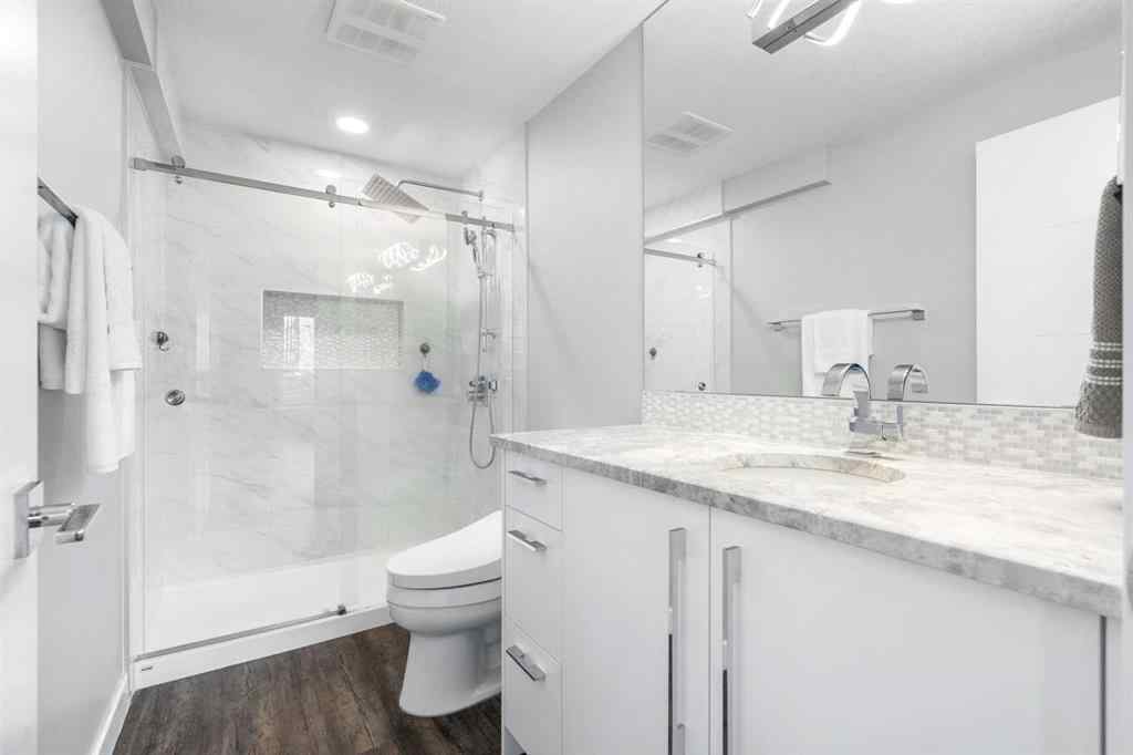 MLS® A2250237 - 117 West Grove Point SW in West Springs Calgary, Residential