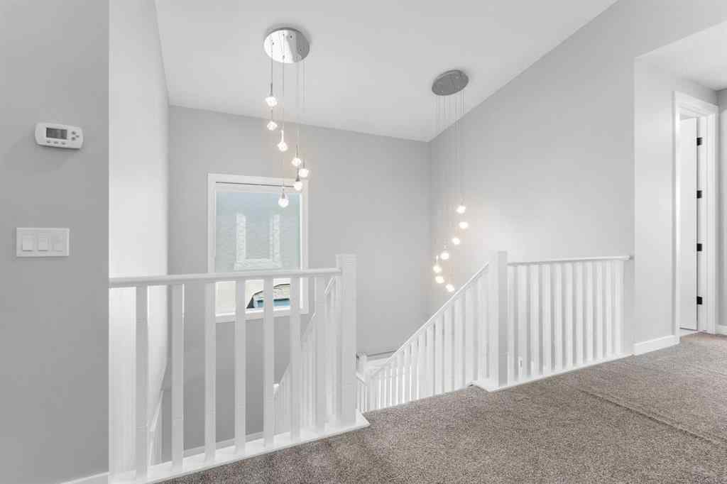 MLS® A2250237 - 117 West Grove Point SW in West Springs Calgary, Residential
