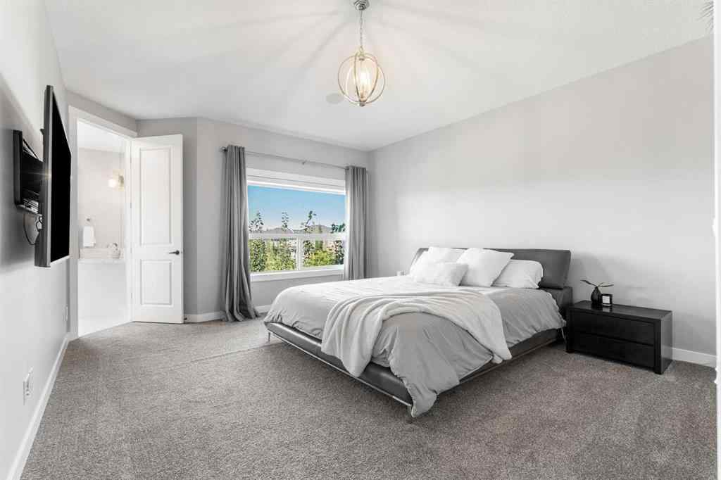 MLS® A2250237 - 117 West Grove Point SW in West Springs Calgary, Residential