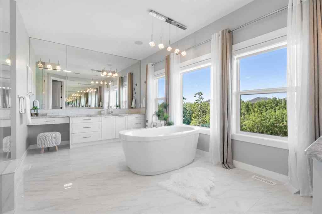 MLS® A2250237 - 117 West Grove Point SW in West Springs Calgary, Residential