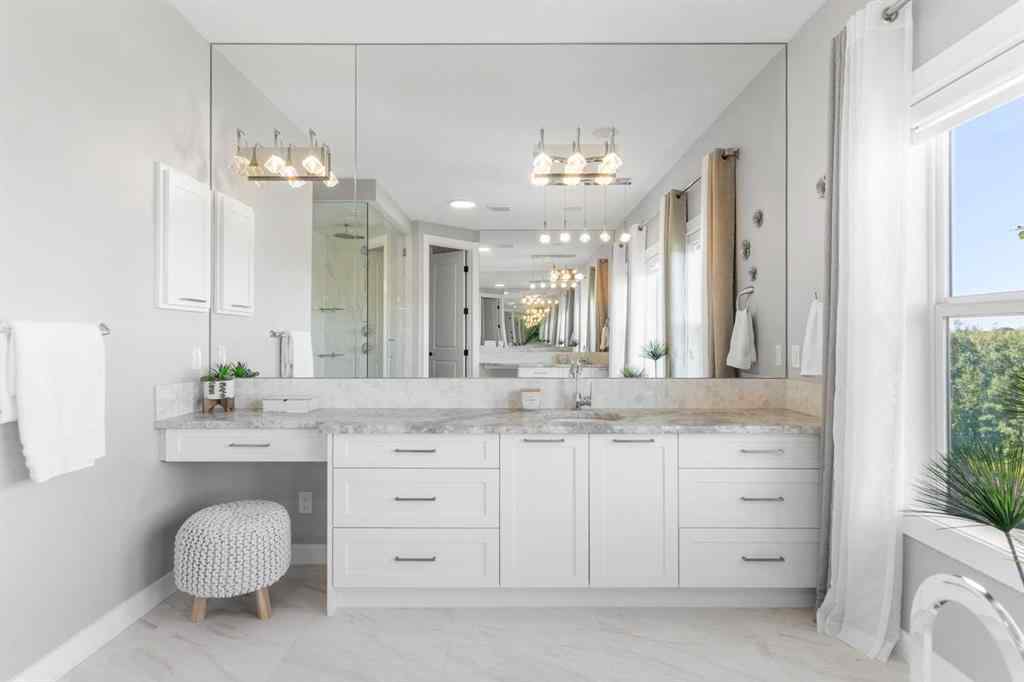 MLS® A2250237 - 117 West Grove Point SW in West Springs Calgary, Residential
