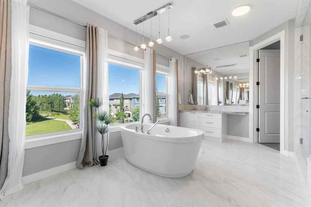 MLS® A2250237 - 117 West Grove Point SW in West Springs Calgary, Residential
