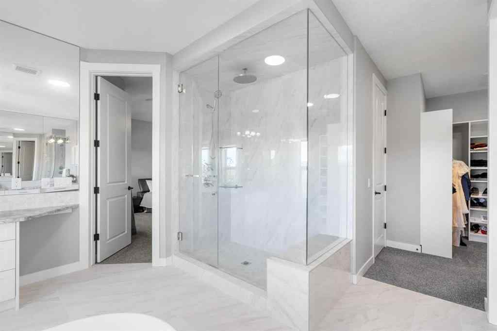 MLS® A2250237 - 117 West Grove Point SW in West Springs Calgary, Residential