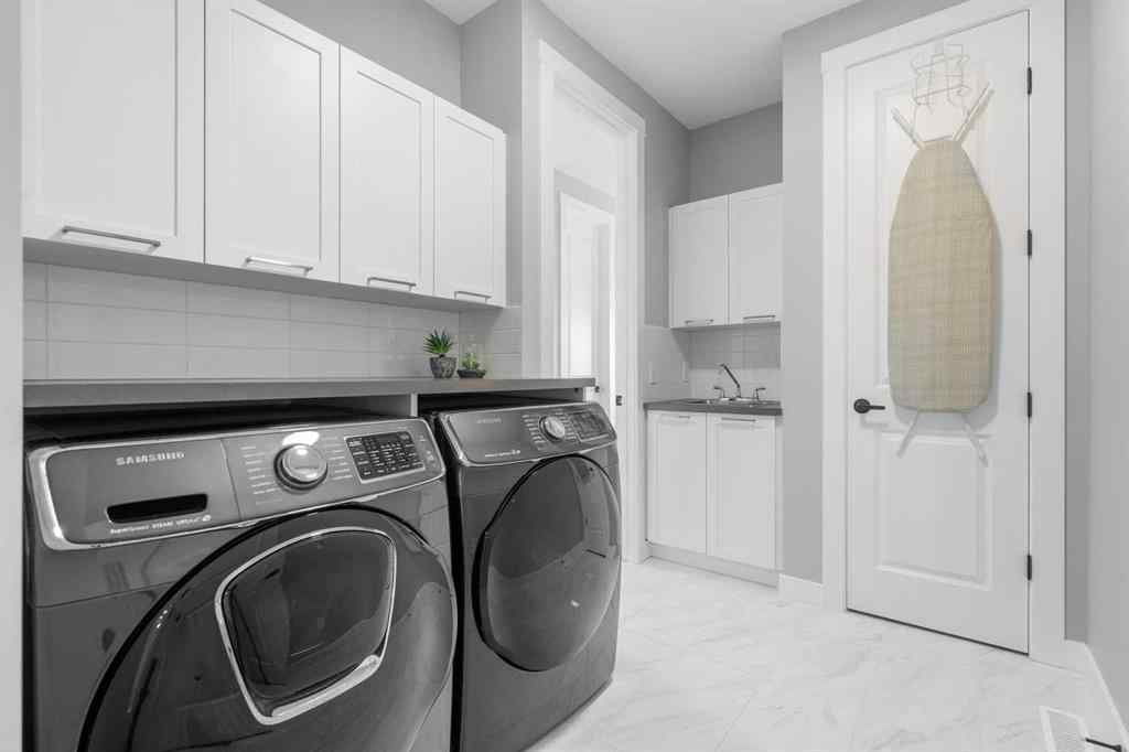MLS® A2250237 - 117 West Grove Point SW in West Springs Calgary, Residential