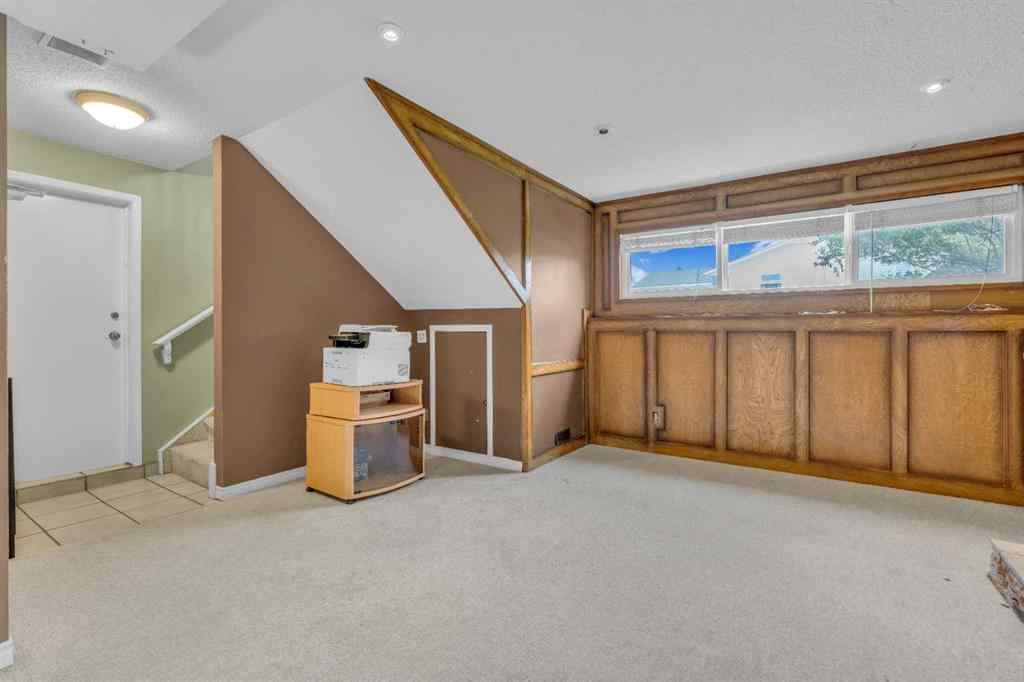 MLS® A2250254 - 403 Queen Alexandra Way SE in Queensland Calgary, Residential