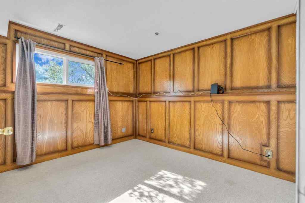 MLS® A2250254 - 403 Queen Alexandra Way SE in Queensland Calgary, Residential